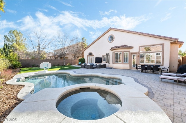 5684 Benevento Ct, Las Vegas, NV 89141 - view of pool with an in-ground hot tub, a patio area, a fenced backyard, and outdoor dining space