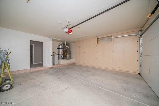 garage featuring secured water heater and a garage door opener