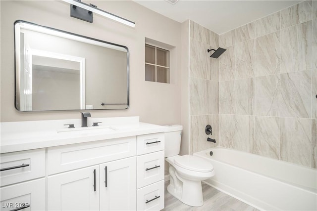 full bathroom with toilet, vanity, shower / washtub combination, and wood finished floors