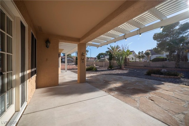 view of patio with a pergola, a fenced backyard, and a residential view