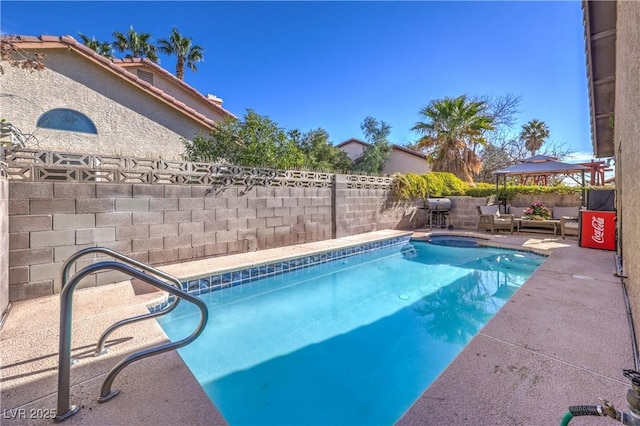 6408 Deadwood Rd, Las Vegas, NV 89108 - view of swimming pool featuring outdoor lounge area, a patio, and a fenced backyard