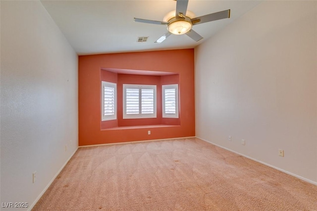 2587 Grizzly Park Ct, Henderson, NV 89052 - unfurnished room with light carpet, vaulted ceiling, ceiling fan, and baseboards