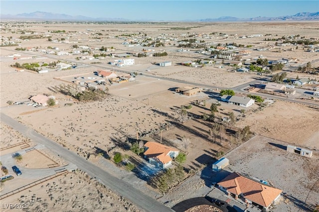 overview of rural landscape featuring a desert landscape and a mountainous background