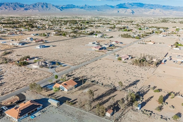 bird's eye view of a desert landscape and mountains