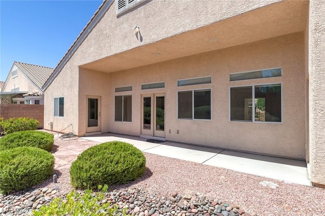 1963 Dakota Lodge Ave, Las Vegas, NV 89123 - back of house with stucco siding and a patio area