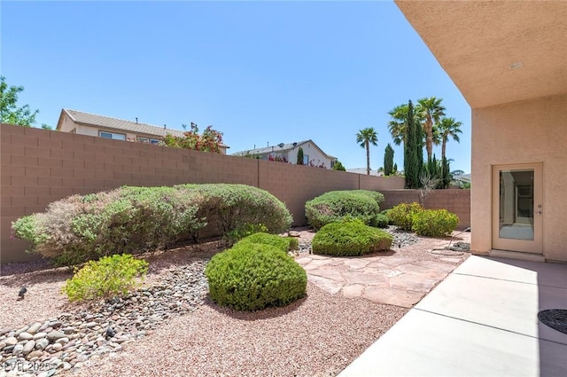 1963 Dakota Lodge Ave, Las Vegas, NV 89123 - fenced backyard with a patio area