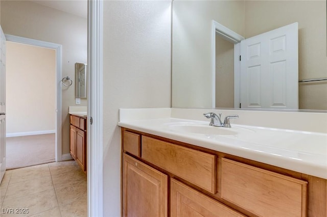 1963 Dakota Lodge Ave, Las Vegas, NV 89123 - bathroom featuring vanity, tile patterned flooring, and baseboards