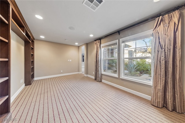7438 Desertscape Ave, Las Vegas, NV 89178 - spare room featuring recessed lighting, light colored carpet, and baseboards