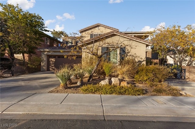 7438 Desertscape Ave, Las Vegas, NV 89178 - view of front of property featuring driveway, stucco siding, and a tiled roof