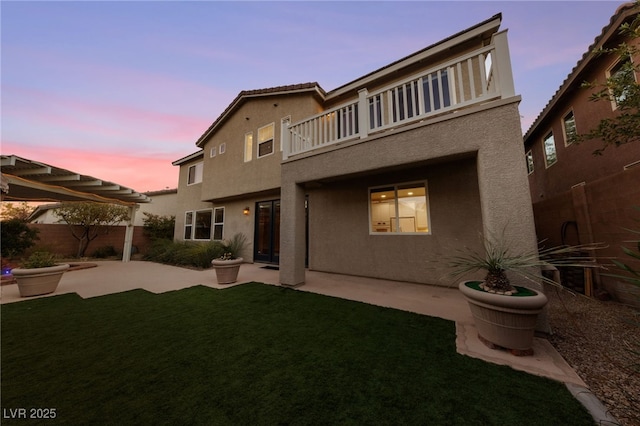 7438 Desertscape Ave, Las Vegas, NV 89178 - back of property featuring a balcony, stucco siding, a pergola, and a patio