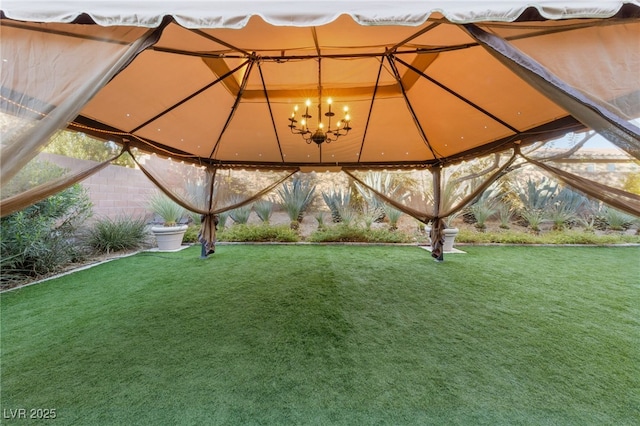 7438 Desertscape Ave, Las Vegas, NV 89178 - surrounding community featuring a gazebo and a yard