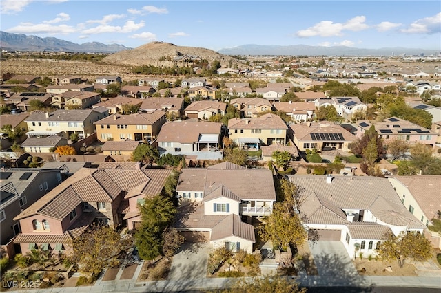 7438 Desertscape Ave, Las Vegas, NV 89178 - aerial view of residential area with a mountainous background