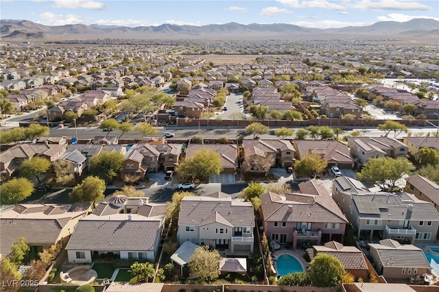 7438 Desertscape Ave, Las Vegas, NV 89178 - aerial perspective of suburban area with a mountainous background