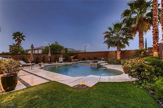 view of pool featuring a patio