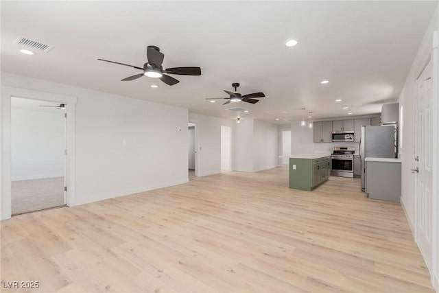 663 D Ave, Boulder City, NV 89005 - unfurnished living room with light wood-style flooring, recessed lighting, a ceiling fan, and baseboards