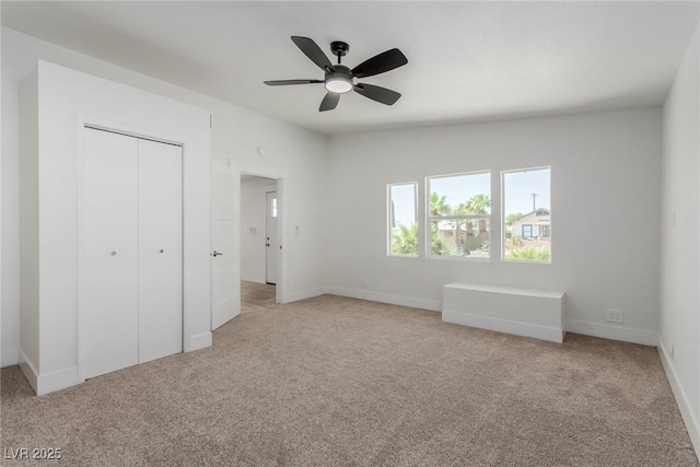 663 D Ave, Boulder City, NV 89005 - unfurnished bedroom featuring light carpet, a closet, baseboards, and a ceiling fan