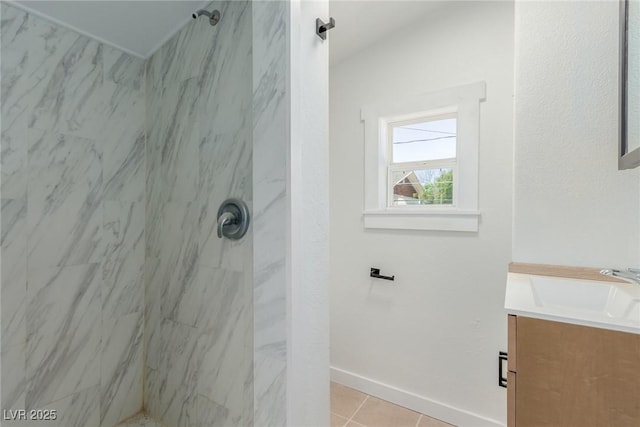 663 D Ave, Boulder City, NV 89005 - bathroom with a marble finish shower, vanity, tile patterned floors, and baseboards