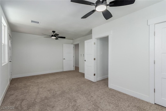 663 D Ave, Boulder City, NV 89005 - unfurnished bedroom with light carpet, baseboards, and a ceiling fan