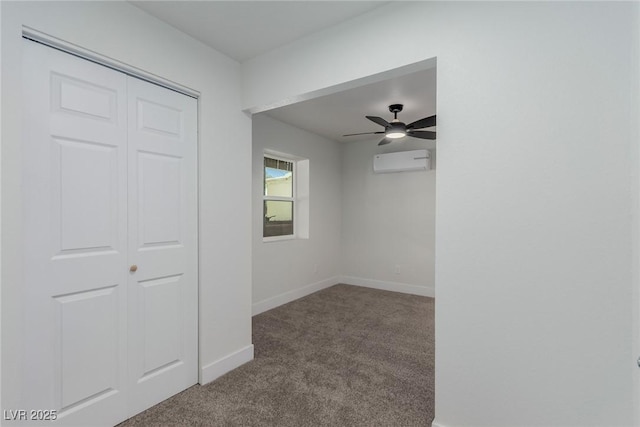 663 D Ave, Boulder City, NV 89005 - empty room with carpet flooring, a wall mounted air conditioner, baseboards, and ceiling fan