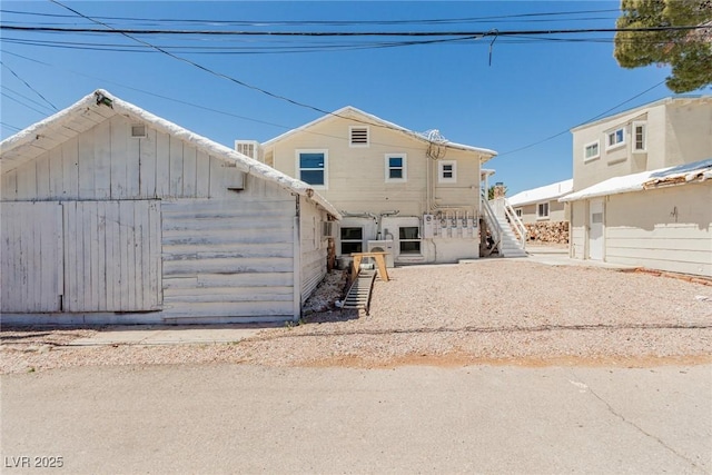 663 D Ave, Boulder City, NV 89005 - view of front facade with stairs and an outdoor structure