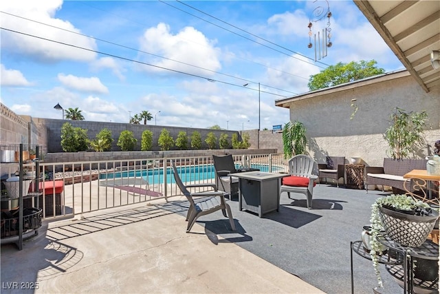 3661 Margarita Way, Las Vegas, NV 89103 - view of patio with a fenced backyard and an outdoor fire pit