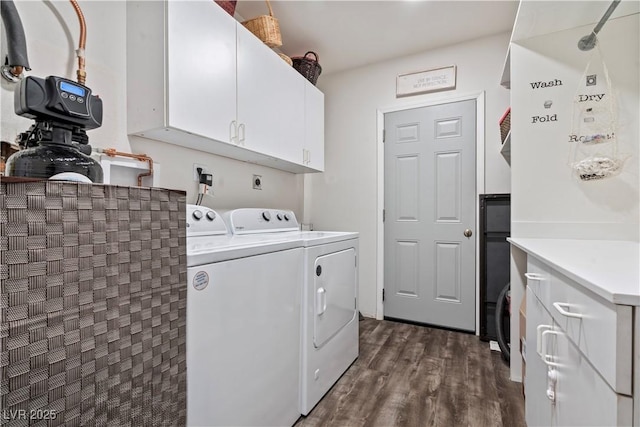 3661 Margarita Way, Las Vegas, NV 89103 - clothes washing area with cabinet space, washing machine and dryer, and dark wood finished floors