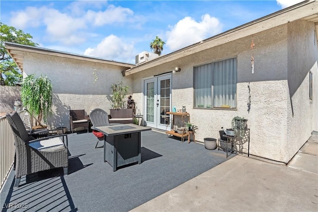 3661 Margarita Way, Las Vegas, NV 89103 - view of patio / terrace with french doors and an outdoor fire pit