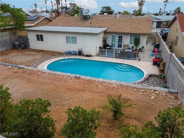 3661 Margarita Way, Las Vegas, NV 89103 - view of pool with french doors, central AC, a patio, and a fenced backyard