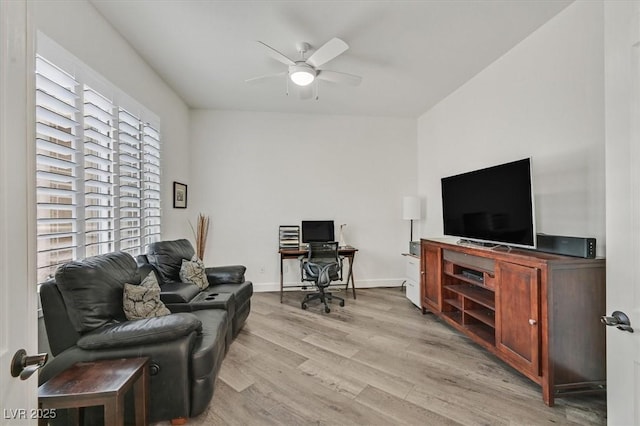 512 Pima Canyon Ct, Las Vegas, NV 89144 - living area featuring a ceiling fan and light wood-style flooring