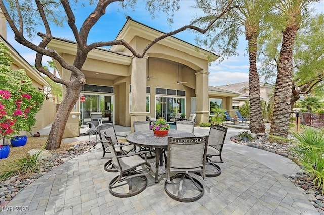 512 Pima Canyon Ct, Las Vegas, NV 89144 - view of patio / terrace featuring outdoor dining area and ceiling fan