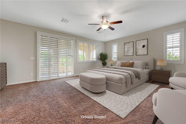 bedroom with multiple windows, carpet floors, a ceiling fan, and baseboards