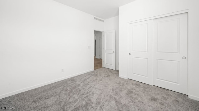 4410 E Brusca Way, Pahrump, NV 89061 - unfurnished bedroom with carpet floors, baseboards, and a closet