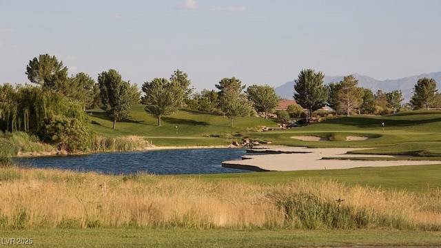 4410 E Brusca Way, Pahrump, NV 89061 - view of community with a water and mountain view, golf course view, and a yard