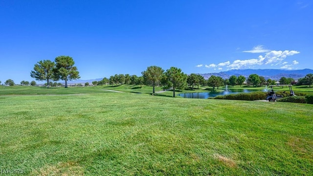 4410 E Brusca Way, Pahrump, NV 89061 - view of property's community featuring a water and mountain view and a yard