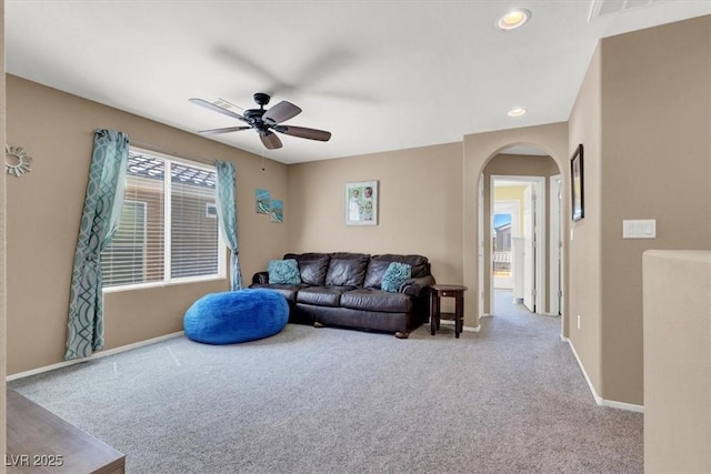 10230 Danskin Dr, Las Vegas, NV 89166 - living room featuring arched walkways, carpet, a ceiling fan, baseboards, and recessed lighting