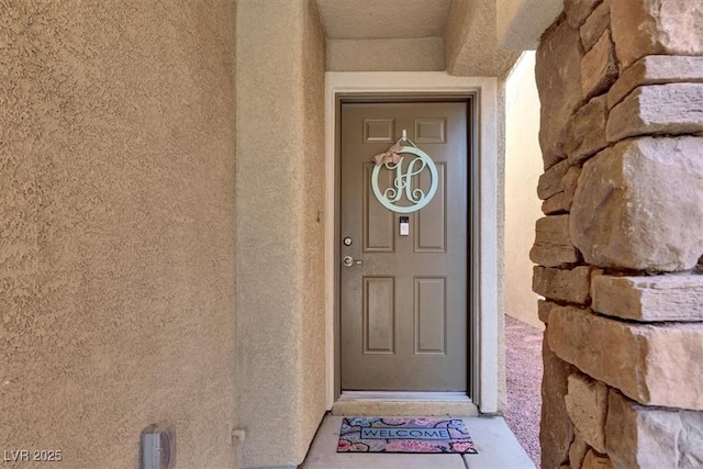 10230 Danskin Dr, Las Vegas, NV 89166 - view of exterior entry featuring stucco siding