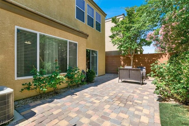 10230 Danskin Dr, Las Vegas, NV 89166 - view of patio / terrace with central AC unit