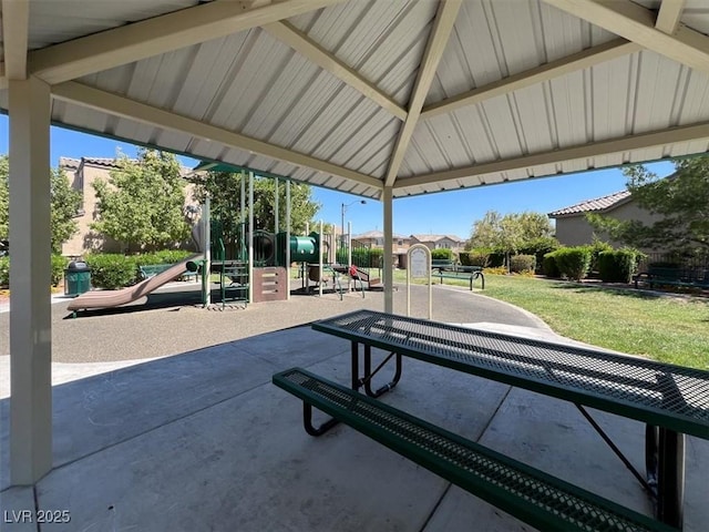 10230 Danskin Dr, Las Vegas, NV 89166 - surrounding community featuring a lawn