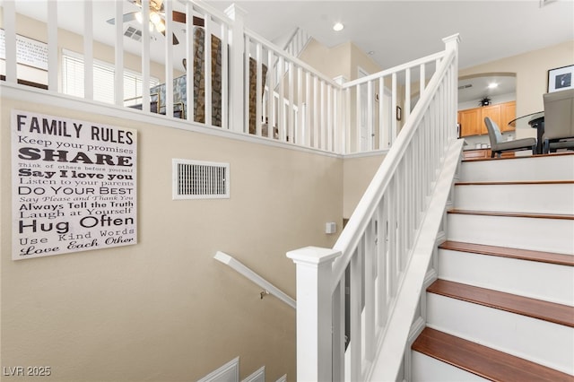 6488 Bentley Wood Ct, Las Vegas, NV 89130 - staircase with a ceiling fan and recessed lighting