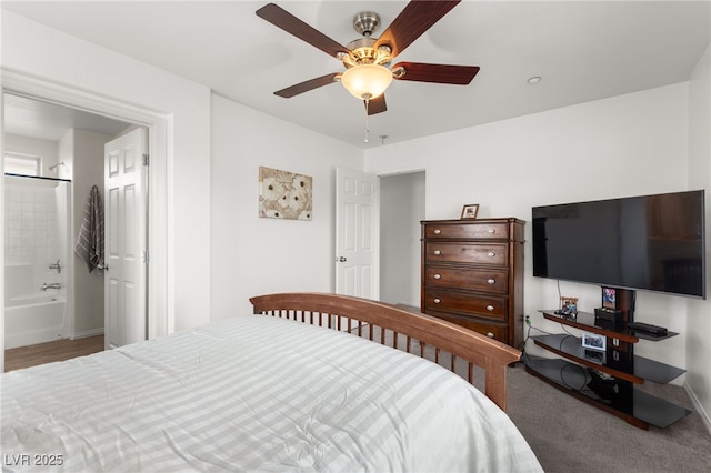 6488 Bentley Wood Ct, Las Vegas, NV 89130 - bedroom with baseboards, a ceiling fan, and ensuite bath