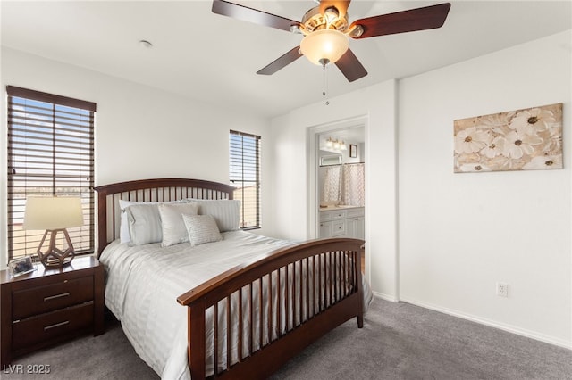 6488 Bentley Wood Ct, Las Vegas, NV 89130 - carpeted bedroom with ensuite bath, baseboards, and a ceiling fan