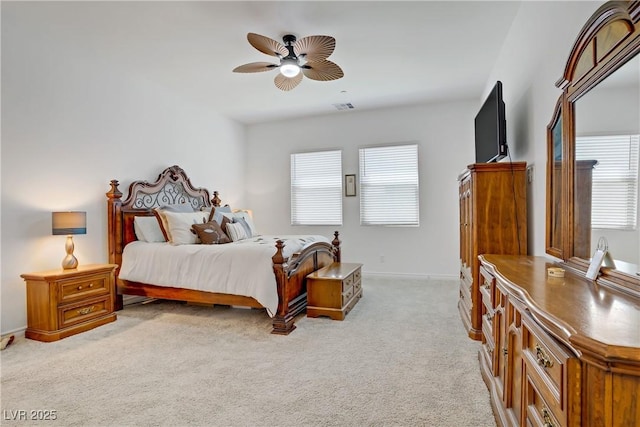 709 Corelli Cove St, Henderson, NV 89011 - bedroom with light carpet, ceiling fan, and baseboards