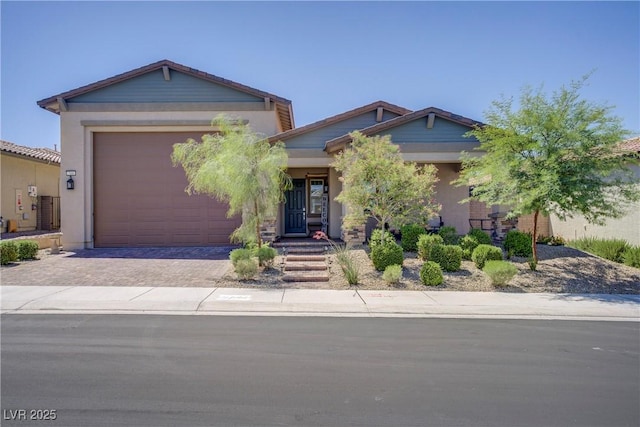 709 Corelli Cove St, Henderson, NV 89011 - craftsman inspired home featuring driveway, an attached garage, and stucco siding