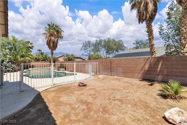 fenced backyard featuring a patio