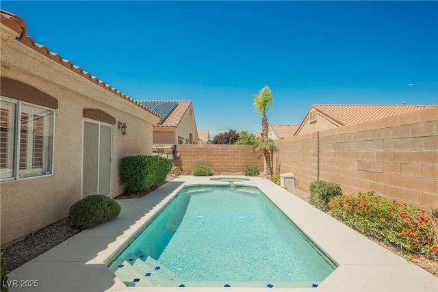 3882 Genoa Dr, Las Vegas, NV 89141 - view of swimming pool with a fenced backyard and a pool with connected hot tub