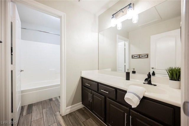 3882 Genoa Dr, Las Vegas, NV 89141 - bathroom with vanity, shower / tub combination, wood finished floors, and baseboards