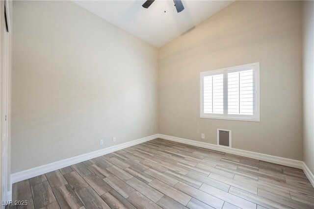 3882 Genoa Dr, Las Vegas, NV 89141 - empty room with lofted ceiling, light wood-style floors, ceiling fan, and baseboards