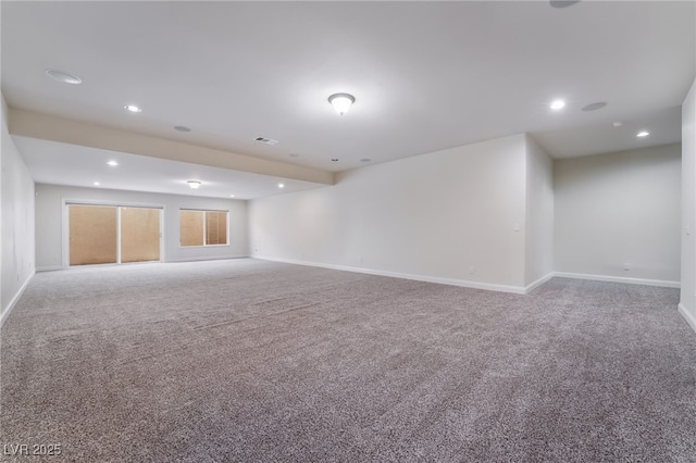 basement with carpet flooring, baseboards, and recessed lighting