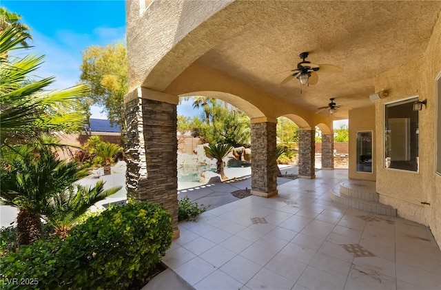 view of patio with ceiling fan and a fenced backyard