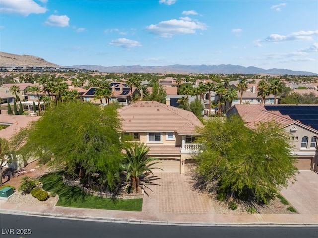aerial view of residential area with mountains